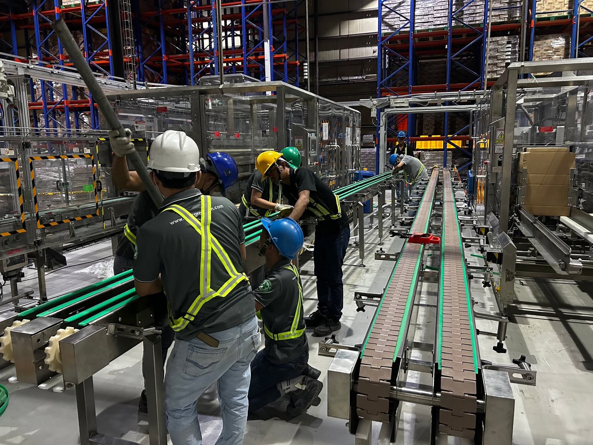 Macgroup technicians commissioning a conveyor installation